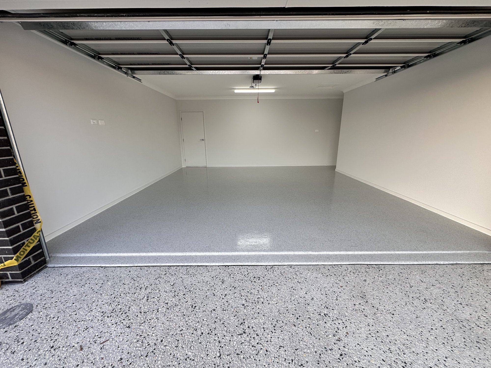 Double garage epoxy flake floor in pebble small flake finish, Yarrabilba